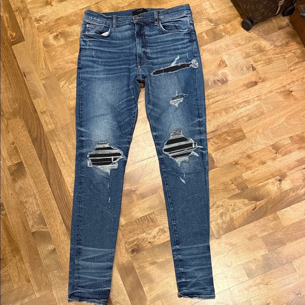 AMIRI Distressed Blue Skinny Jeans
